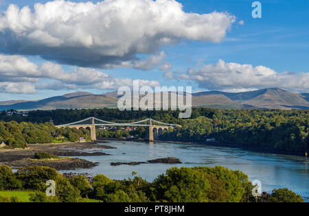 The Menai Bridge, designed by Thomas Telford, spanning the Menai Straits and linking North Wales mainland with Anglesey Stock Photo