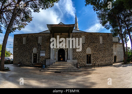 Birgi, hidden in a green geography on the cool slopes of Bozdağlar, can be seen from centuries-old plane trees and walnut trees with high stone walls, Stock Photo