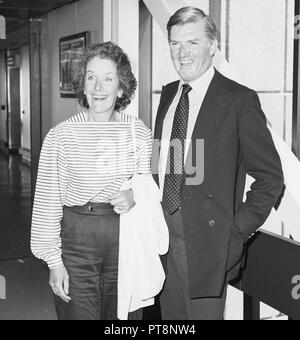 Cecil Parkinson and his wife Anne arriving at Heathrow Airport August 1985. Stock Photo