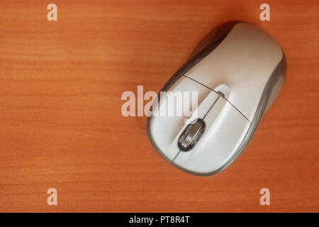 Wireless computer mouse on a table top view, copyspace Stock Photo