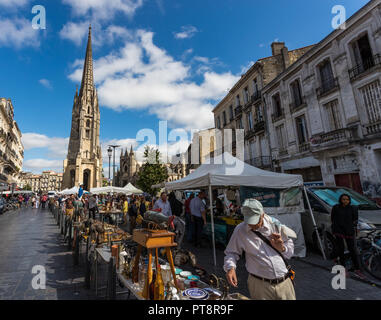 BORDEAUX, FRANCE- September 23rd, 2018: People shopping at Place de Saint Michael antique flea market on Sunday morning. Stock Photo