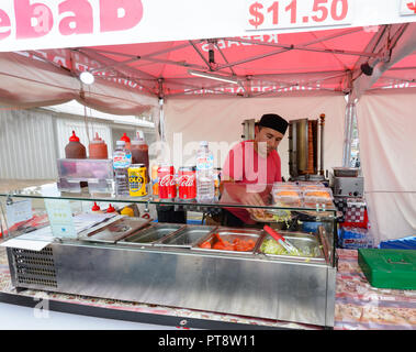 Young man selling Turkish kebabs, Australian Camp Oven Festival 2018, Millmerran, Southern Queensland, QLD, Australia Stock Photo