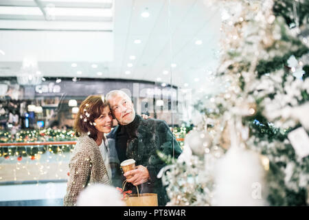 USA, Illinois, Metamora, Martini glasses with candies inside against  illuminated Christmas tree Stock Photo - Alamy