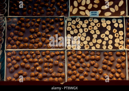handmade brown chocolate bars with nut in view Stock Photo