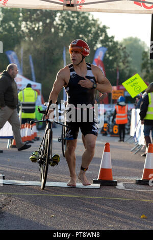 A competitor leaving transition in the Warwickshire Triathlon Super Sprint, Stratford-upon-Avon, UK Stock Photo