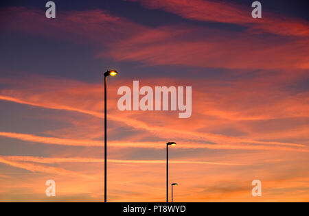 red sunset and illuminated street lighting, cambridge, england Stock Photo