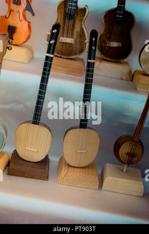 Set of models of musical instruments made of wood Stock Photo - Alamy