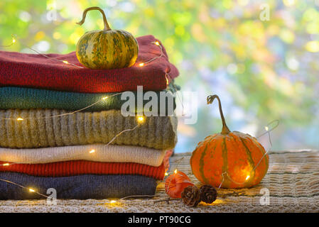 Autumn Pile of Warm knitted sweaters Stock Photo