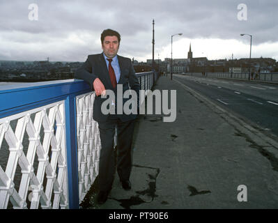 John Hume, Irish politician standing in front of Derry, Londonderry, Northern Ireland. Former leader of the Social Democratic and Labour Party of Northern Ireland. Served as a Member of the European Parliament and a Member of the UK Parliament, as well as a member of the Northern Ireland Assembly. Co-recipient of the 1998 Nobel Peace Prize, with David Trimble.1980s Stock Photo