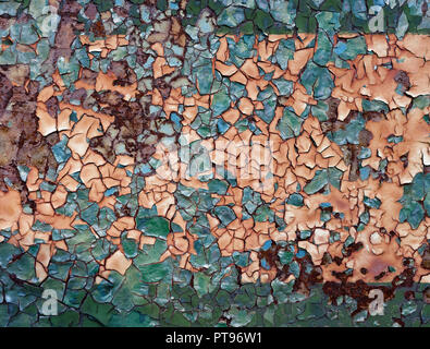Backgrounds and textures: layers of old cracked paint on rusty metal surface Stock Photo