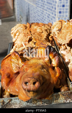 Hornados or Roast Pig Saint John of Sangolqui food market, Ecuador, Stock Photo