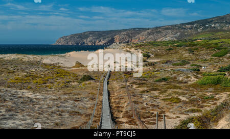 The steps that lead to the Atlantic Ocean found in Guincho beach near Lisbon, Portugal. Stock Photo