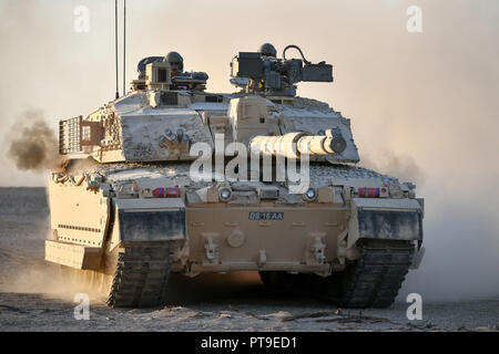 Challenger II Main Battle Tank crews take shade in the Oman desert ...