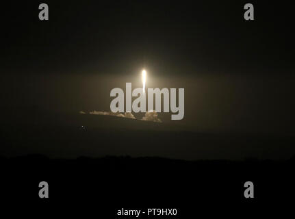 Vandenberg Air Force Base, USA  Oct 07, 2018 A SpaceX Falcon 9 rocket lifts off carrying an Argentinian Earth-observing satellite into space and the booster returns to earth after blasting off Sunday from Vandenberg Air Force Base in California. Credit: Daniel Dreifuss/Alamy Live News Stock Photo