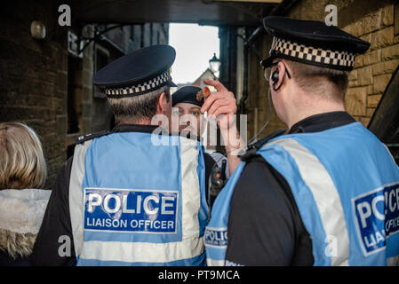 A member of the Pro-Union side is seen making threats to photographers during a heated argument with a Police Scotland officer following a near physical altercation with a member of the Pro-Indy side.  Thousands of Scottish independence supporters marched through Edinburgh as part of the ‘all under one banner’ protest, as the coalition aims to run such event until Scotland is ‘free’. Stock Photo