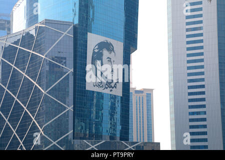 Doha / Qatar – October 8, 2018: A styalised image of Sheikh Tamim bin Hamad al Thani created by Ahmed Almaadheed on the side of a building in central Doha Stock Photo