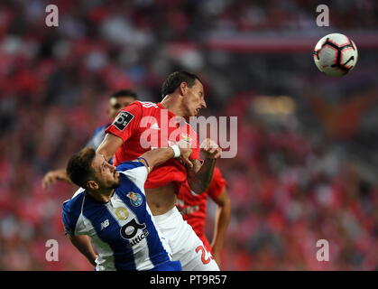 (181008) -- LISBON, Oct. 8, 2018 (Xinhua) -- Cristian Lema (R) of Benfica vies with Hector Herrera of Porto during the Portuguese League soccer match between SL Benfica and FC Porto at Luz Stadium in Lisbon, Portugal, Oct. 7, 2018. Benfica won 1-0. (Xinhua/Zhang Liyun) Stock Photo