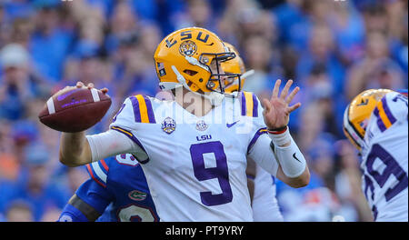 FILE - In this Jan. 1, 2019, file photo, LSU quarterback Joe Burrow attends  warmups before the Fiesta Bowl NCAA college football game against UCF in  Glendale, Ariz. This year, a group