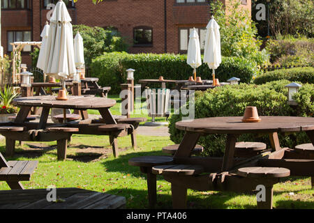 Empty tables outside a pub restaurant in Stratford upon Avon Warwickshire. Stock Photo