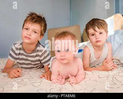 Brothers and sister background. Happy family concept. Beautiful children. Stock Photo