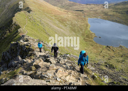 Helvellyn mountain peak and Red Tarn corrie lake, Lake District Stock ...