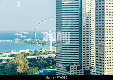 Singapore, August 18, 2018: Aerial view of Suntec City and Singapore Flyer with sea Stock Photo