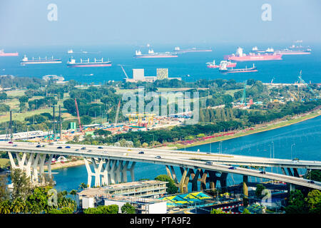 Singapore - August 18 2018: Aerial bird's eye view of Marina East Singapore featuring East Coast Expressway, Gardens by the Bay East, sea and ships Stock Photo