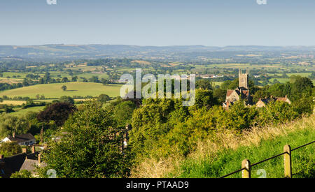 The dairy farmland of the Blackmore Vale presents a patchwork of pasture fields and woodland viewed from Park Walk in the hilltop town of Shaftesbury. Stock Photo