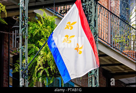 The New Orleans city flag hangs in the French Quarter, November 11, 2015, in New Orleans, Louisiana. Stock Photo