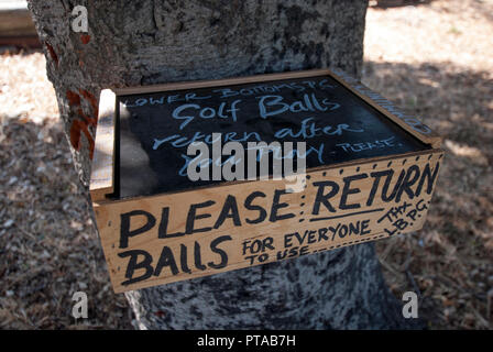 A box of balls for a neighborhood putting green in Raimondi Park in West Oakland. The green has been there since 2007 but is often poorly maintained. Stock Photo