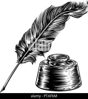 Quill pen and bottle of ink Stock Photo - Alamy