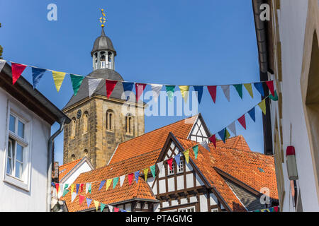 Church tower and half timbered houses in Tecklenburg, Germany Stock Photo