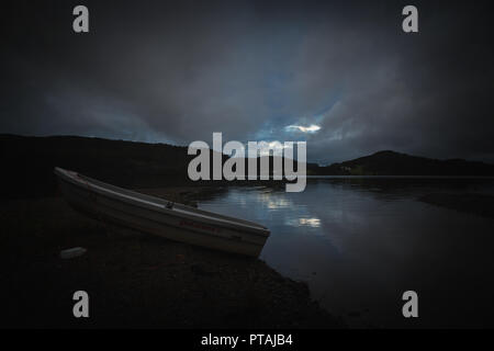 Dark moods after sunset. The night is coming on Jonsvatnet lake. NOrway, Trondheim area. Stock Photo