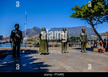 CAPE TOWN, SOUTH AFRICA – 20 MARCH 2018: Beautiful Nobel Square at the waterfront with statues of Peace Prize winners Mandla, de Klerk, Tutu and Luthu Stock Photo