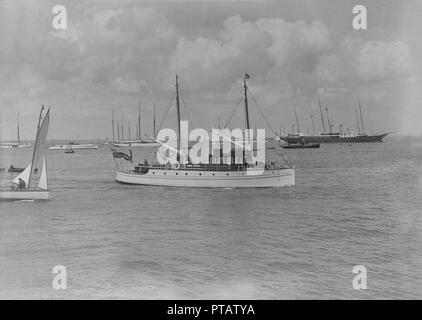 The motor yacht 'Silver Cloud' under way, 1920. Creator: Kirk & Sons of Cowes. Stock Photo