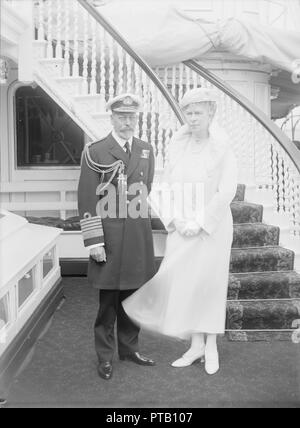 King George V and Queen Mary aboard 'HMY Victoria and Albert', 1935. Creator: Kirk & Sons of Cowes. Stock Photo