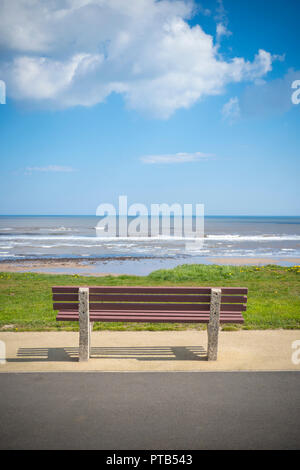 Concrete and wood bench overlooking the sea Stock Photo - Alamy