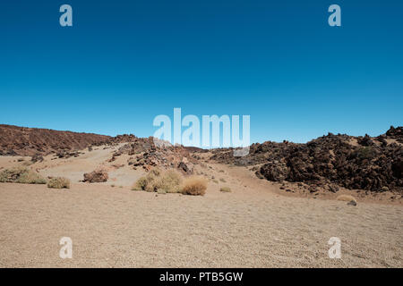 rocky  desert landscape with rocks and blue sky copy space Stock Photo