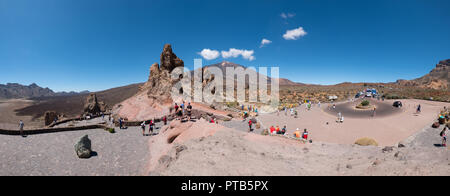 Tenerife, Canary Islands, Spain - September 2018:  People at Roque Cinchado rock at Roques De Garcia Parque Nacional Del Teide Tenerife Spain Stock Photo