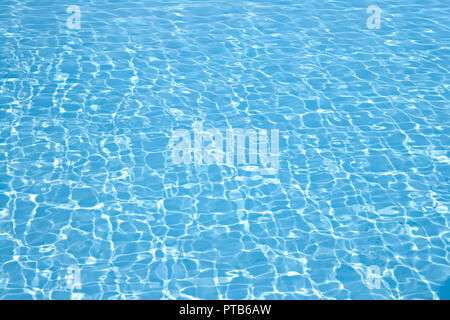 Wonderful crystal light blue clear water of a swimming pool Stock Photo