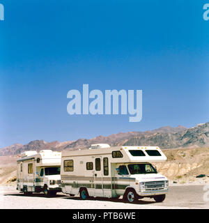 DEATH VALLEY,USA- JANUARY 14,2016: RV in the middle of Death Valley National Park, USA. In summer time it is forbidden to drive with campers in Death  Stock Photo