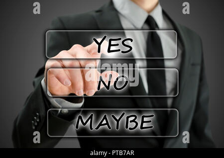Yes-No-Maybe text in navigation bars on a virtual screen or interface with a businessman activating the yes button with his finger from behind Stock Photo