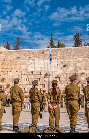 IDF soldiers at Western Wall. The IDF conducts a mixed gender swearing in ceremony Stock Photo