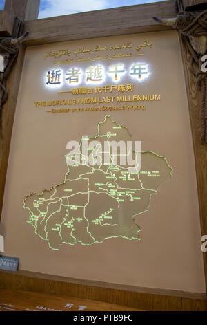 Urumchi, Xinjiang, China - September 13, 2018 :  Entrance sign for Xinjiang Mummy exhibition in Urumchi, Xinjiang Autonomous Region, China. Stock Photo