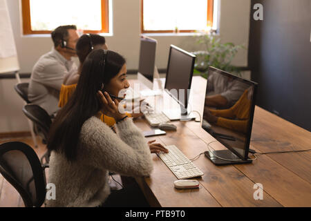 Business colleagues working on computer in office Stock Photo