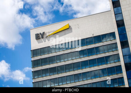 Logo of Ernst & Young on the office building in Eschborn / Frankfurt Stock Photo