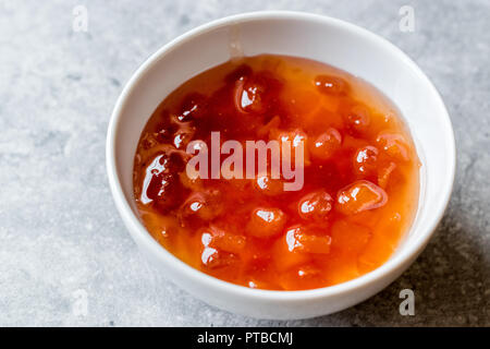 Homemade Quince Jam in Small Ceramic Bowl / Marmalade. Organic Food. Stock Photo