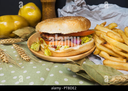 Cheese burger - American cheese burger with Golden French fries Stock Photo