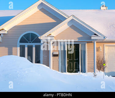 Entrance to a suburban home after a winter storm. Stock Photo