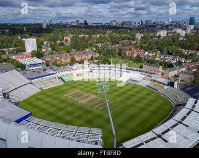An aerial view of Edgbaston Cricket Club ground, home of Warwickshire County Cricket Club showing the Birmingham City Centre skyline. Stock Photo